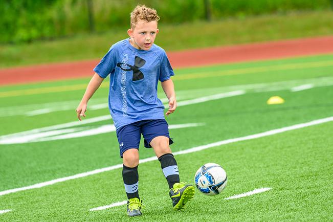 Cooper playing soccer